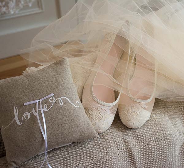 wedding shoes, pillow, and veil