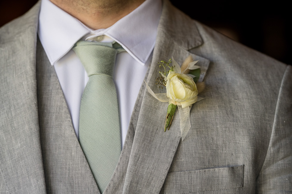 mens suit with corsage