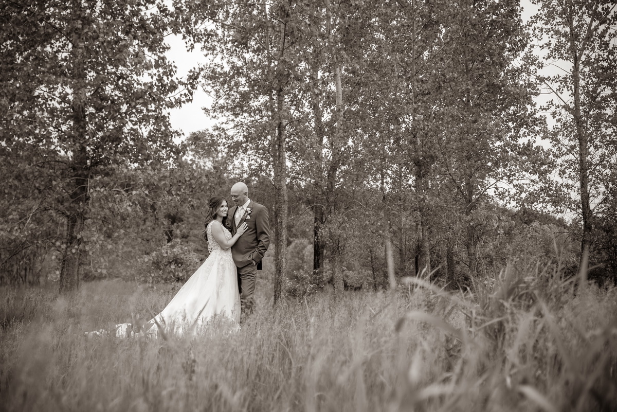 wedding couple in field