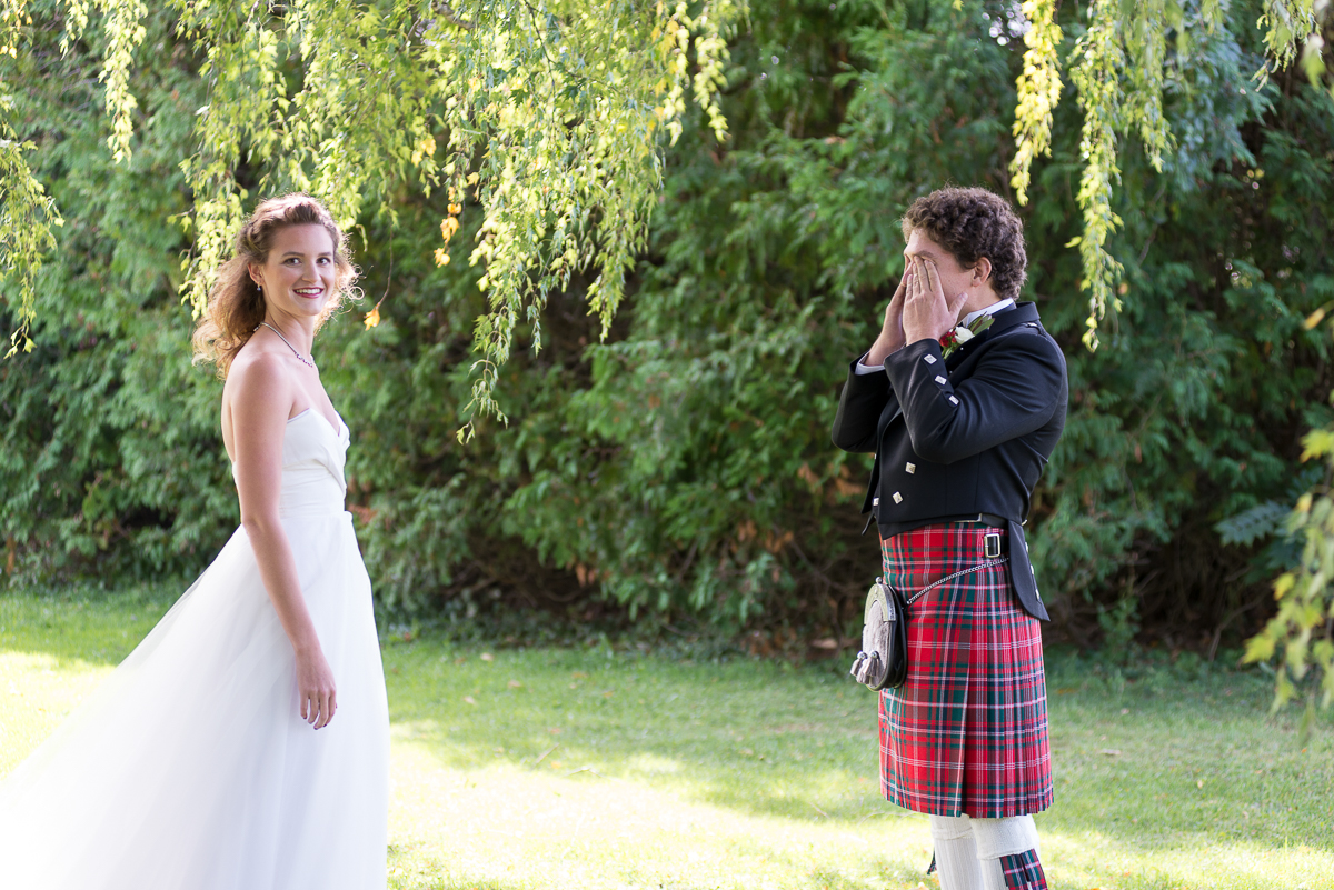 first look photos of bride and groom