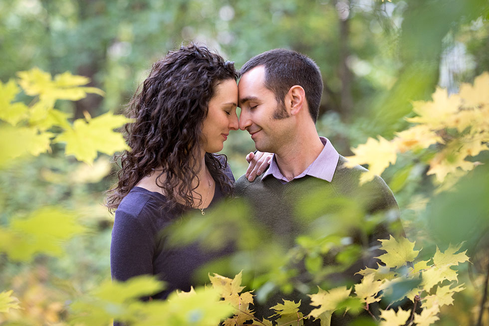 engaged couple heads close