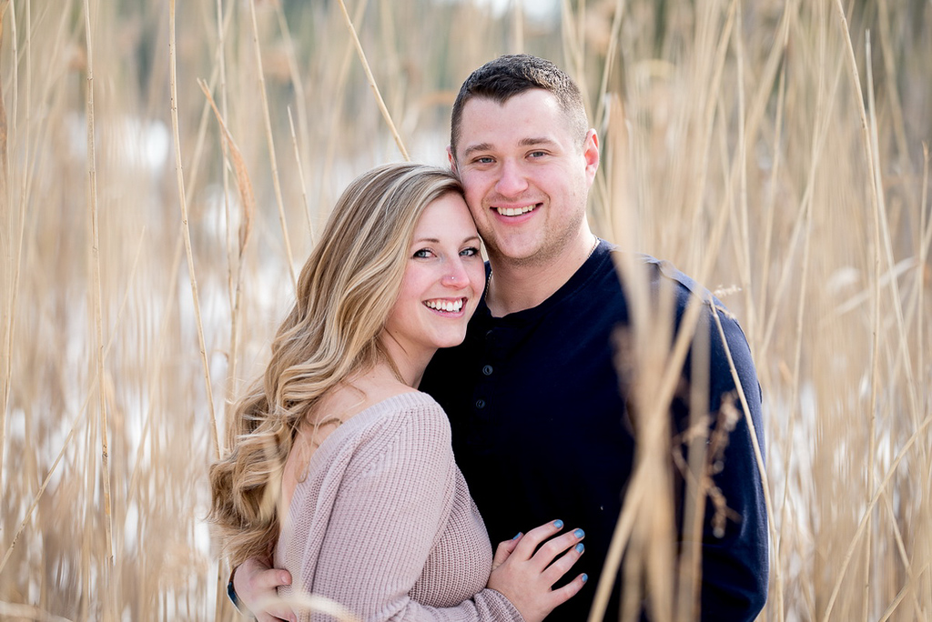 engagement photo shoot in straw field