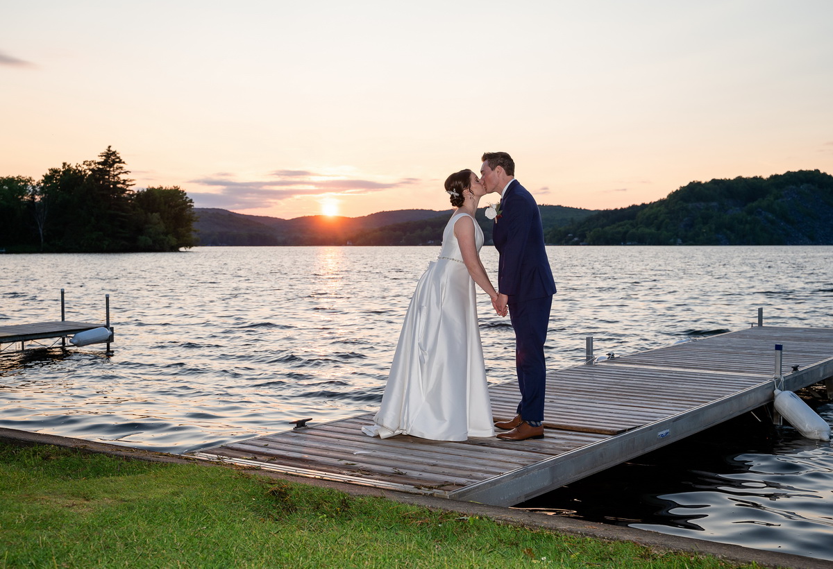 Vermont wedding lakeside sunset kiss