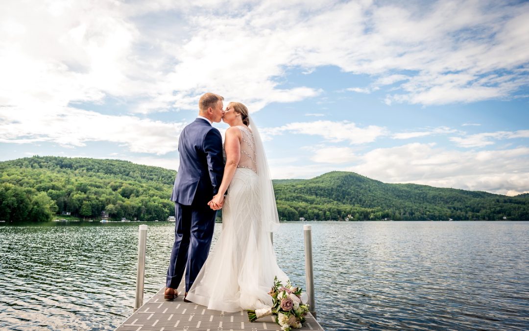 lakeside wedding kiss